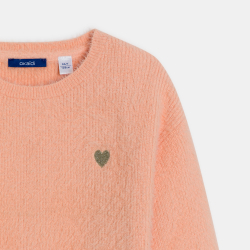 كنزة باللون البرتقالي، من...